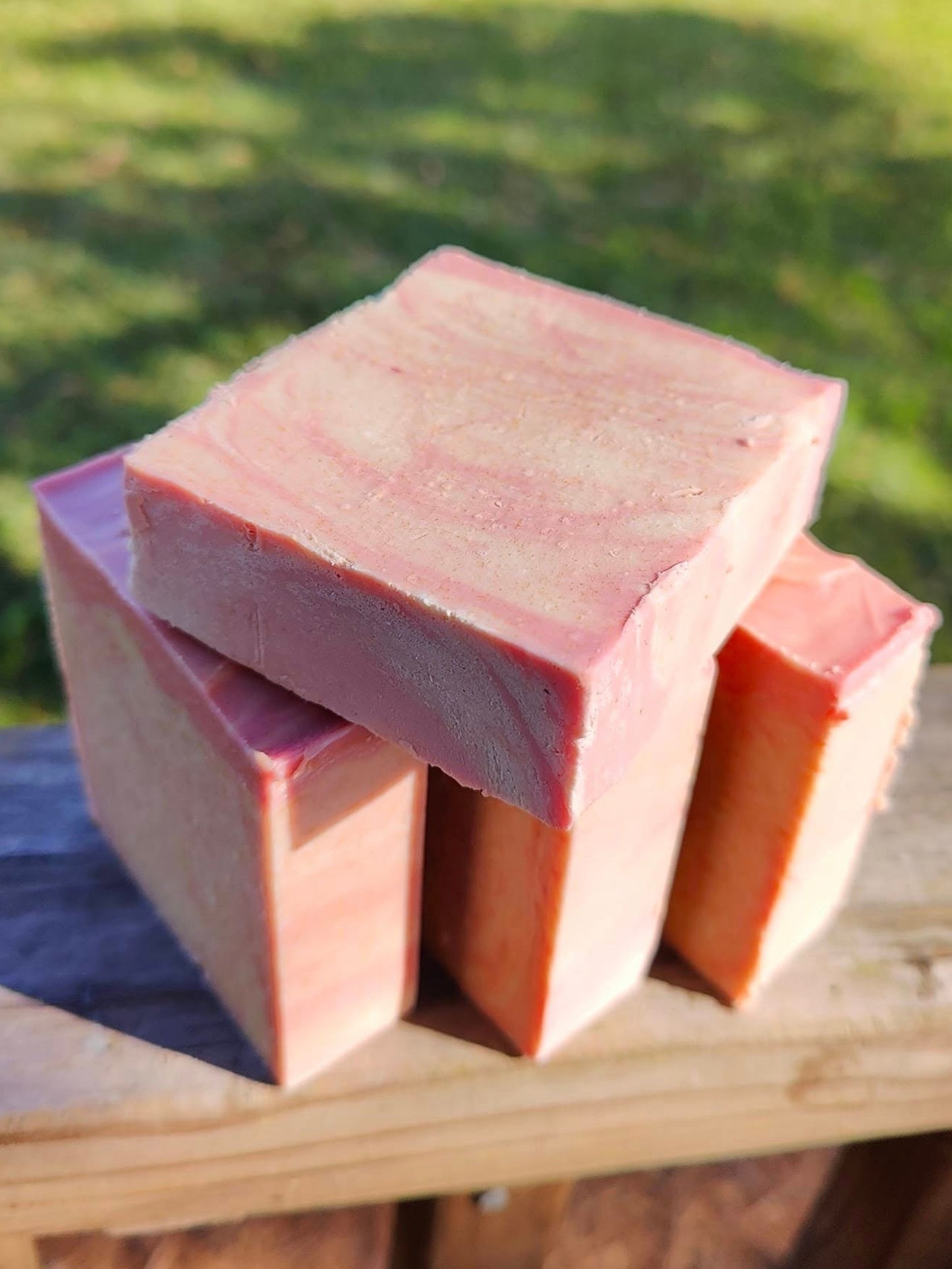 Blackberry Magnolia handmade goat milk tallow soap collection showing detail