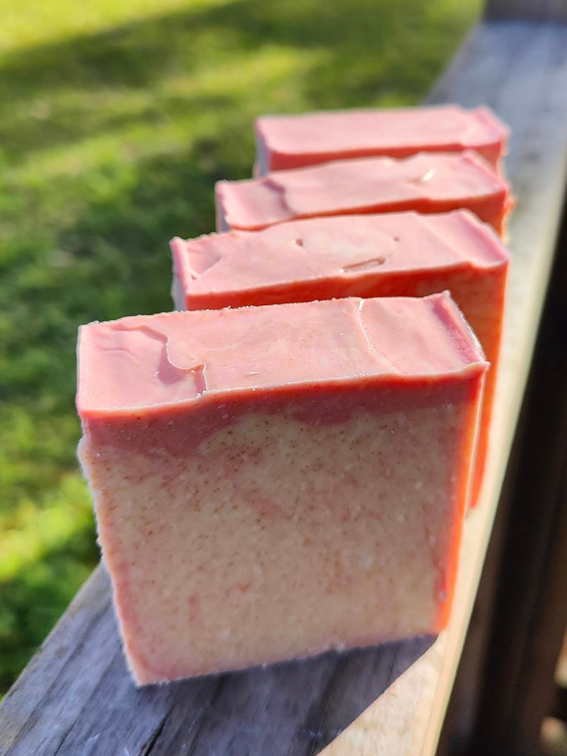 Blackberry Magnolia Goat Milk Soap collection showing top and front detail