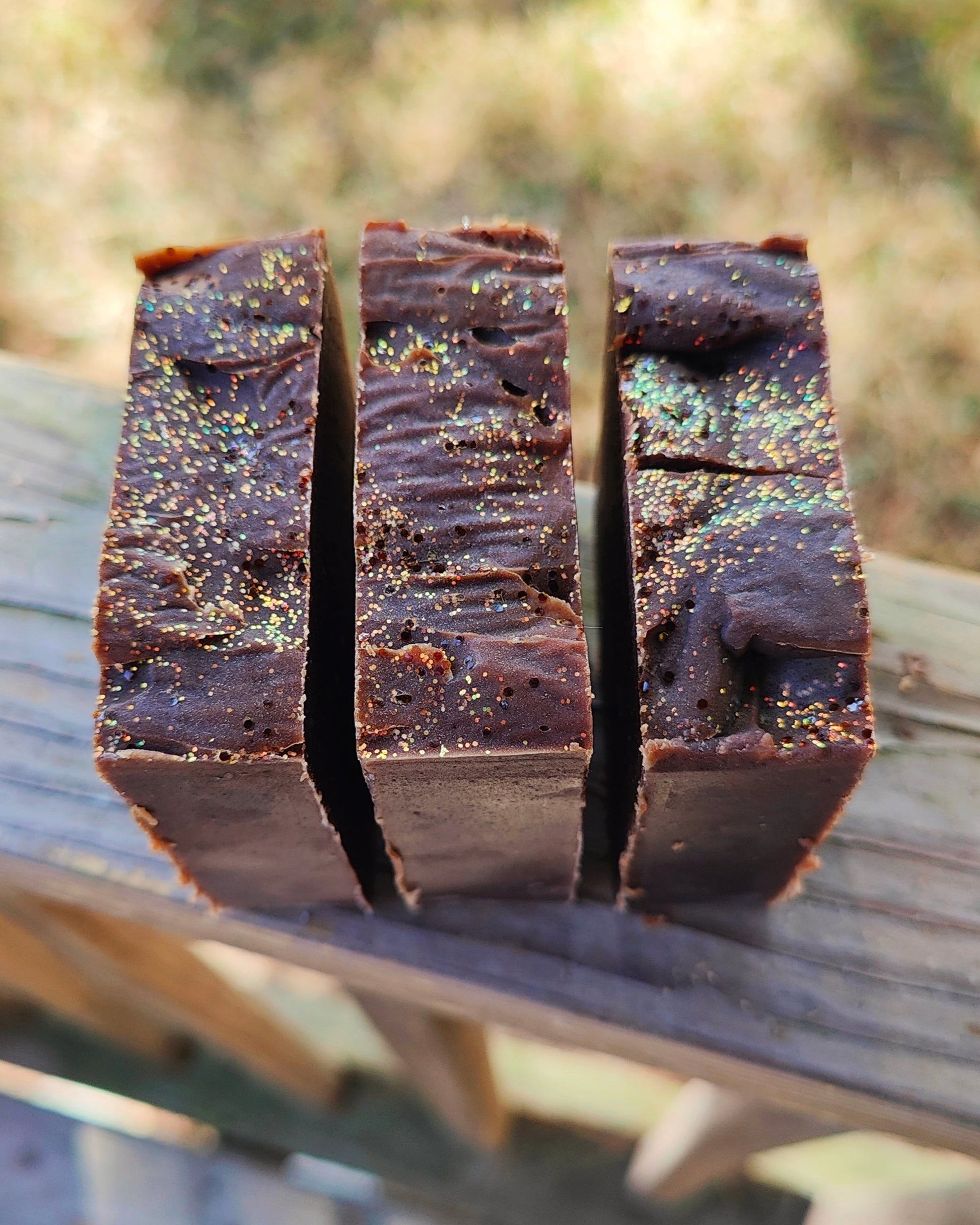 Handmade sugar and spice goat milk tallow soap bar top view showing texture